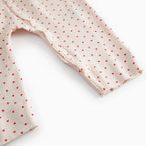 Baby carried with a sweet heart print and button closure the entire way way way