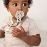 Baby with toys and teething rings