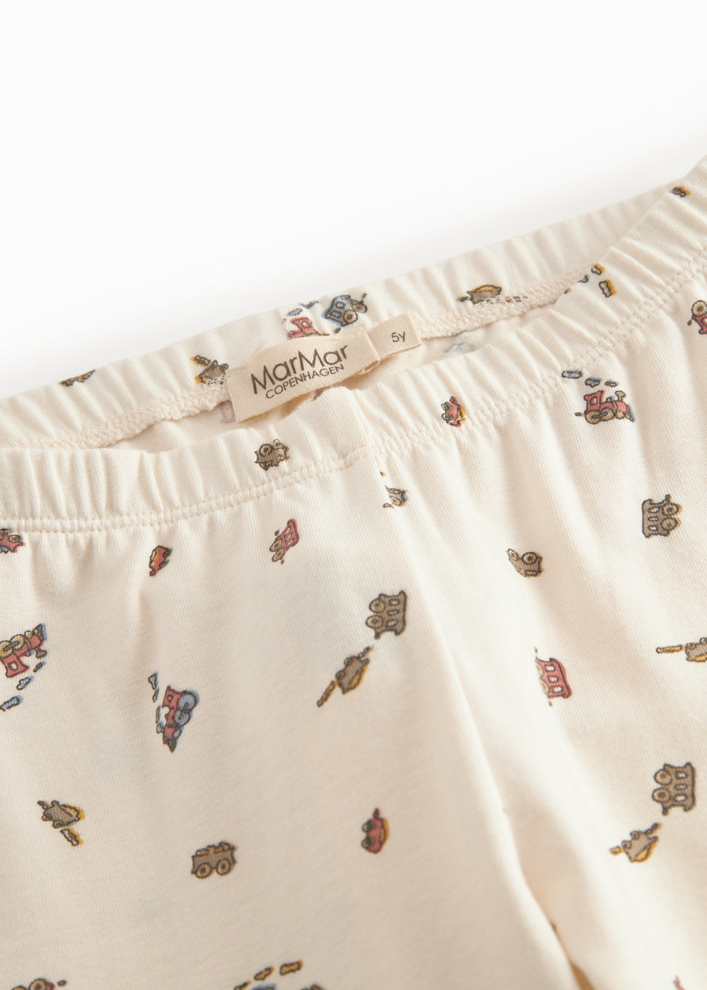 Children's clothing sets with train prints.