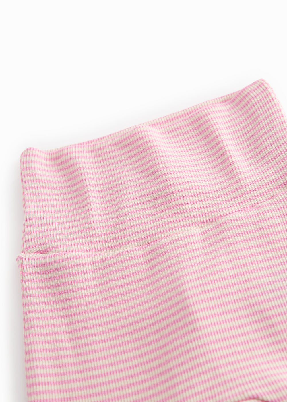 Red striped pants with feet for a newborn baby