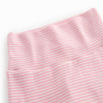 Red striped pants with feet for a newborn baby