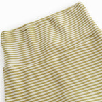 Green-striped pants with feet for a newborn baby