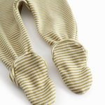 Green-striped pants with feet for a newborn baby