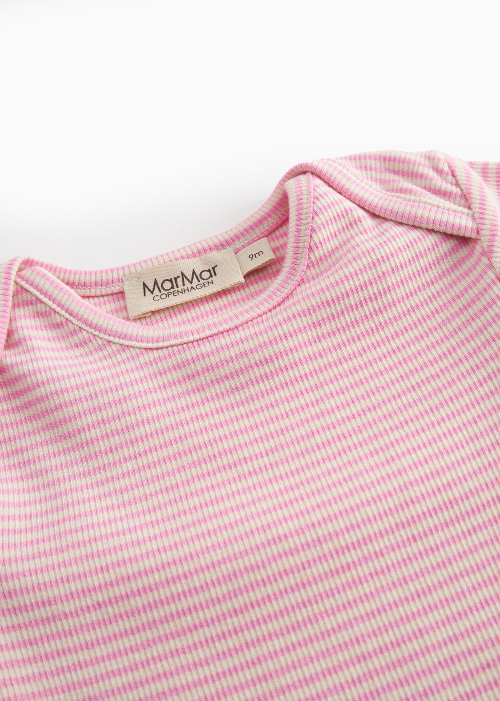 Short-sleeved baby bodystocking with red stripes.