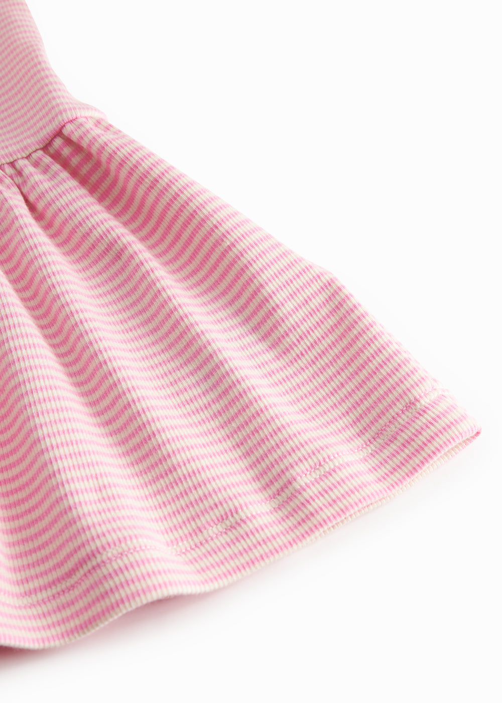 Red striped children's dress with long sleeves and a skirt.