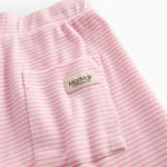 Children's shorts with red stripes, wide elastic, and suspenders.