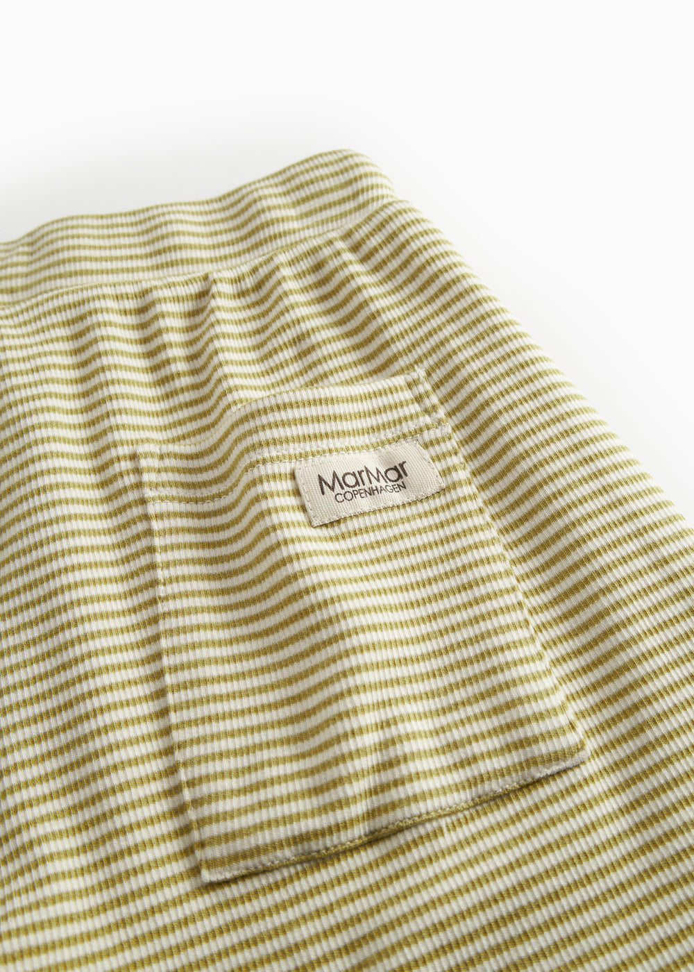 Children's shorts with green stripes, wide elastic, and drawstrings.