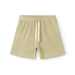 Children's shorts with green stripes, wide elastic, and drawstrings.