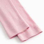 Leggings for children with bright red stripes.