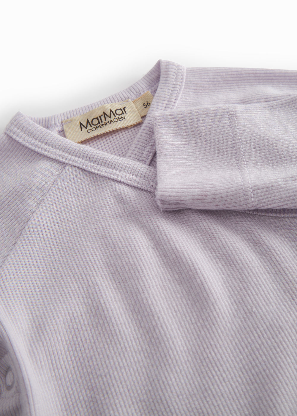 Lightly lined light purple bodystocking for newborns with snap closure.