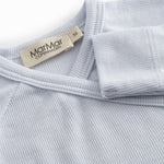 Light blue long-sleeved shirt for newborns with a wrap-around closure