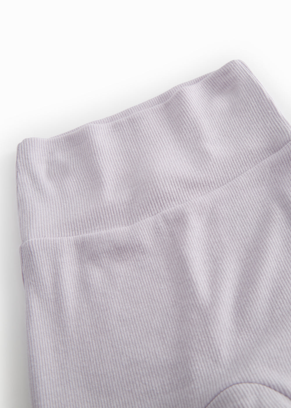 Light pink baby pants with feet.