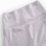 Light pink baby pants with feet.