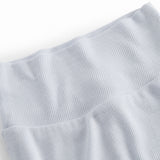 Lyseblå bukser med fødder til de nyfødte