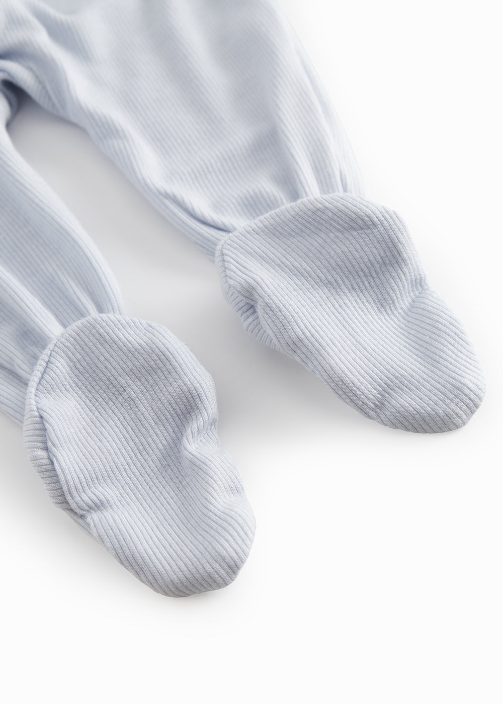 Lyseblå bukser med fødder til de nyfødte