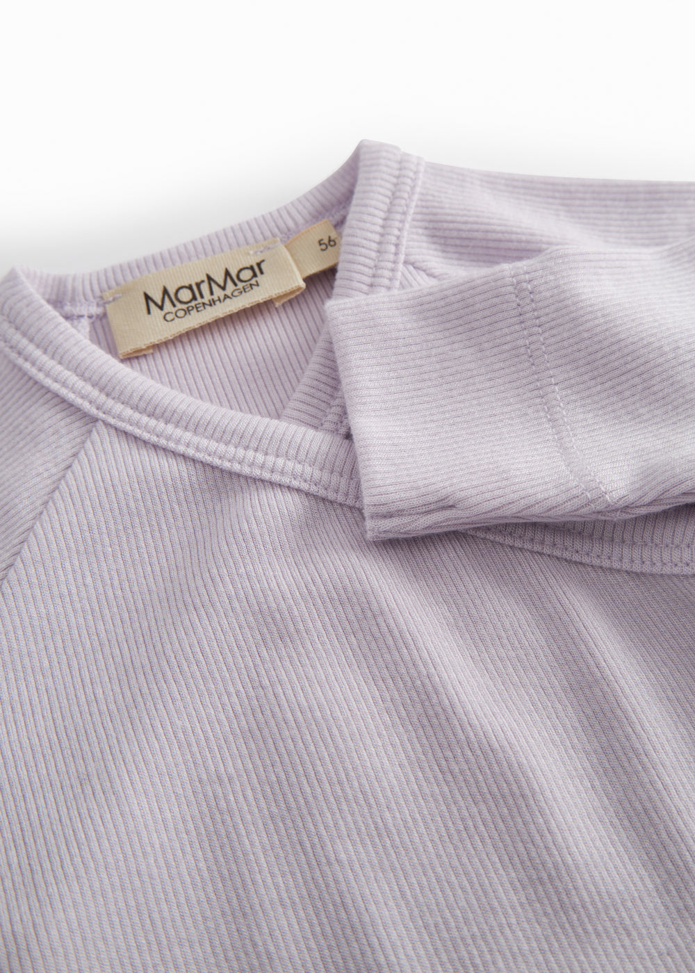 Lightly colored baby dress with feet