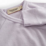 Lightly colored baby dress with feet