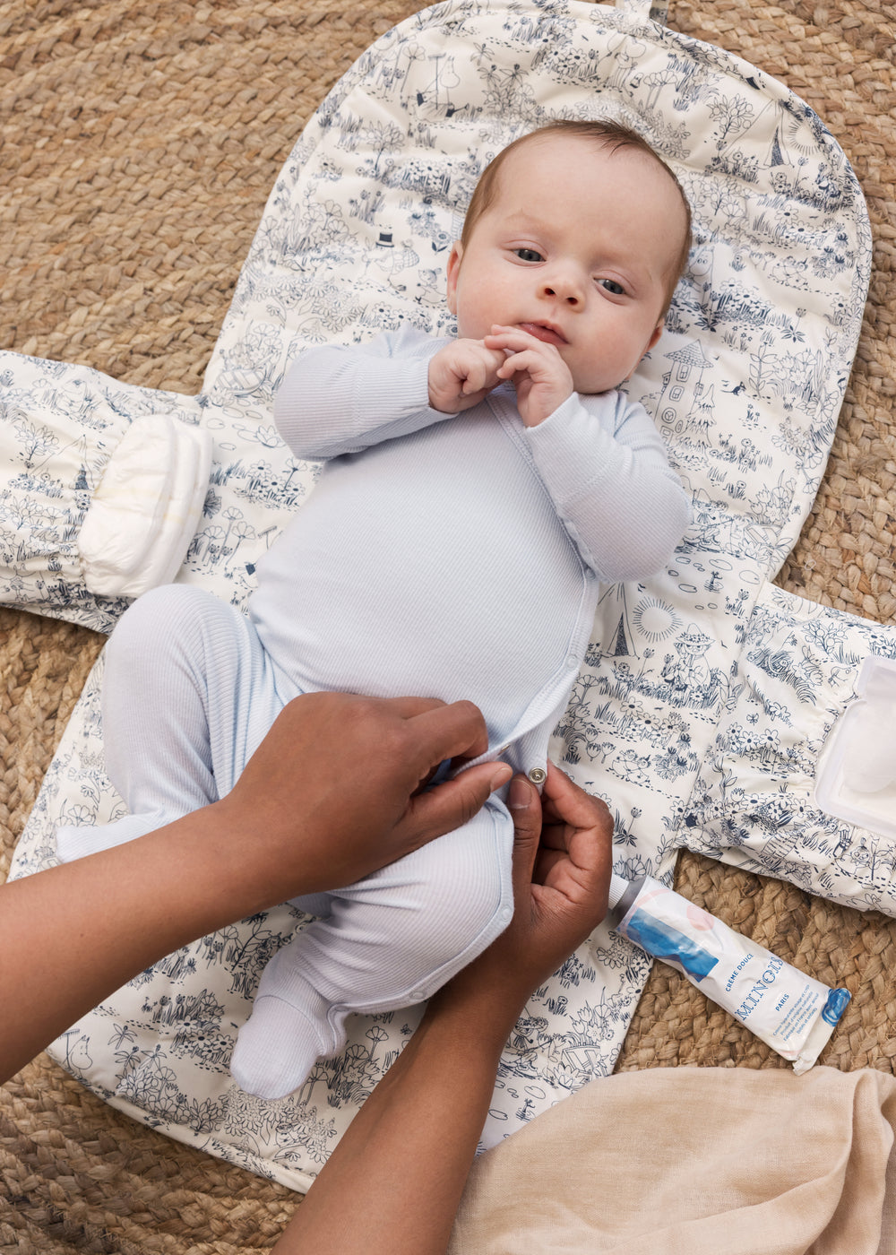 Baby on a Puzzle Mat with Sweet Moomin Print