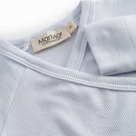 Light blue long-sleeved onesie with a snap closure for newborns