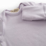 Light pink long-sleeved onesie for newborns.