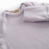 Light pink long-sleeved onesie for newborns.