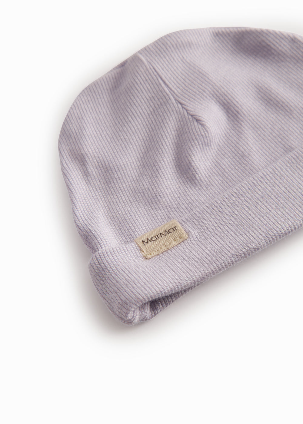 Light pink hat for newborn with edge that can be folded up or down.