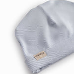 Azure hue for newborn with a border that can be folded up or down