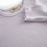 Lightly colored long-sleeved baby bodystocking