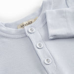 Light blue baby bodystocking with a peplum closure at the front