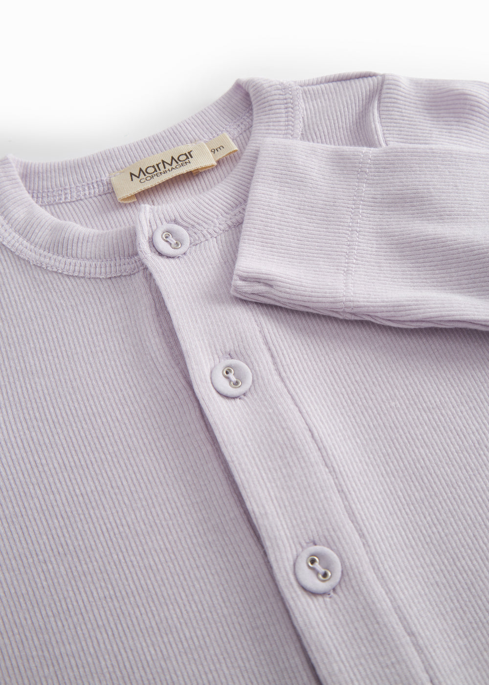 Light pink baby dress with a long peplum.