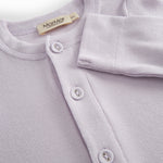 Light pink baby dress with a long peplum.