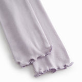 Lys lilla leggings til børn med fine flæsedetaljer forneden