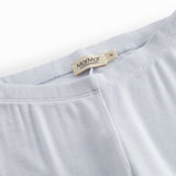 Lyseblå leggings til børn med fine flæsedetaljer forneden