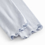 Lyseblå leggings til børn med fine flæsedetaljer forneden