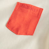 Short-sleeved baby T-shirt in raw white with contrasting sleeves and chest pocket.