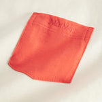 Short-sleeved children's T-shirt in raw white with contrast sleeves and chest pocket.