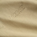 Short beige polo t-shirt for children with collar and button-up