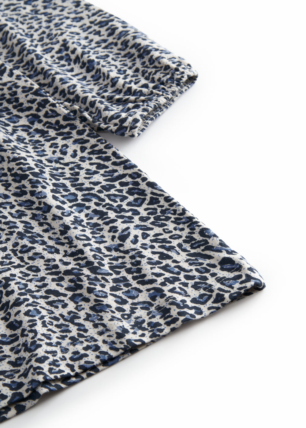Leopard blue dress for children with elastic in the sleeves and a button-up back.
