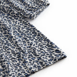 Leopard blue dress for children with elastic in the sleeves and a button-up back.