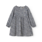 Leopard blue dress for children with elastic in the sleeves and a button-up back.