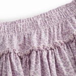 Red lower body for children in leopard print with waist and elastic at the waist.