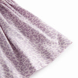 Red lower body for children in leopard print with waist and elastic at the waist.