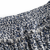 Leopard print blue skirt with waistband and elastic in the waist.