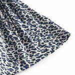 Leopard print blue skirt with waistband and elastic in the waist.