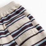 Striped baby sweatpants with elastic in the waist and pocket.