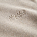 Beige long-sleeved sweatshirt for children with ribbed cuffs.