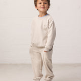 Children wearing sweatpants with pockets and ribbed waistband, matching matching matching.