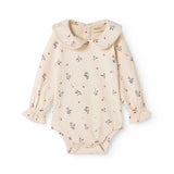 Langärmet baby bodystocking with floral print and collar