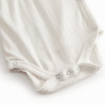 Langærmet hvid pointelle bodystocking til nyfødte