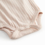 Langærmet lyserød pointelle bodystocking for newborns